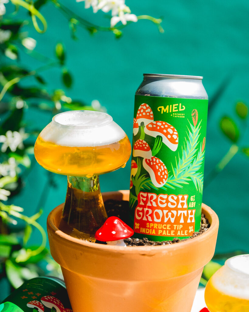 Fresh Growth 16-oz can mock-up and mushroom glassware