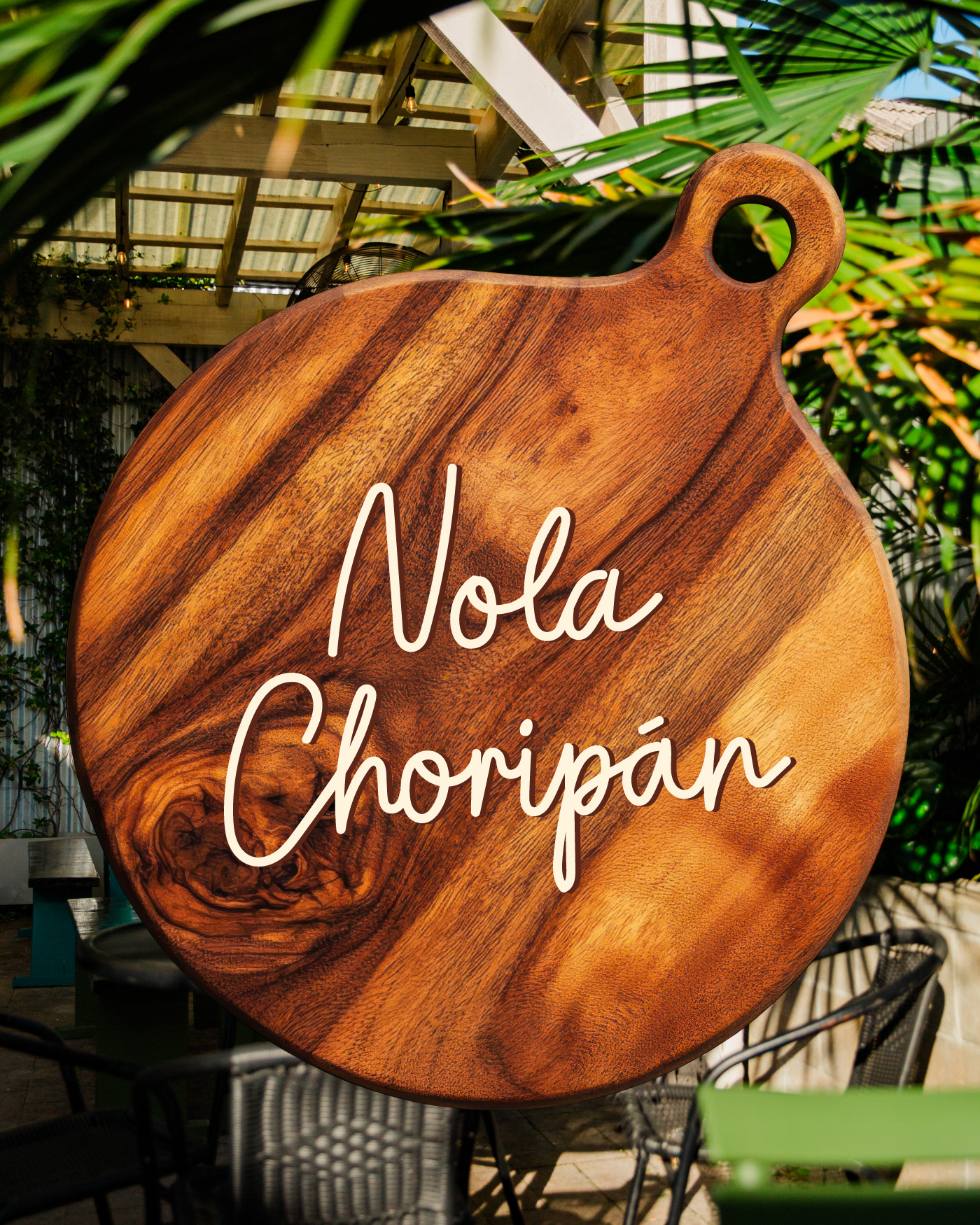 Nola Choripan at Miel Logo