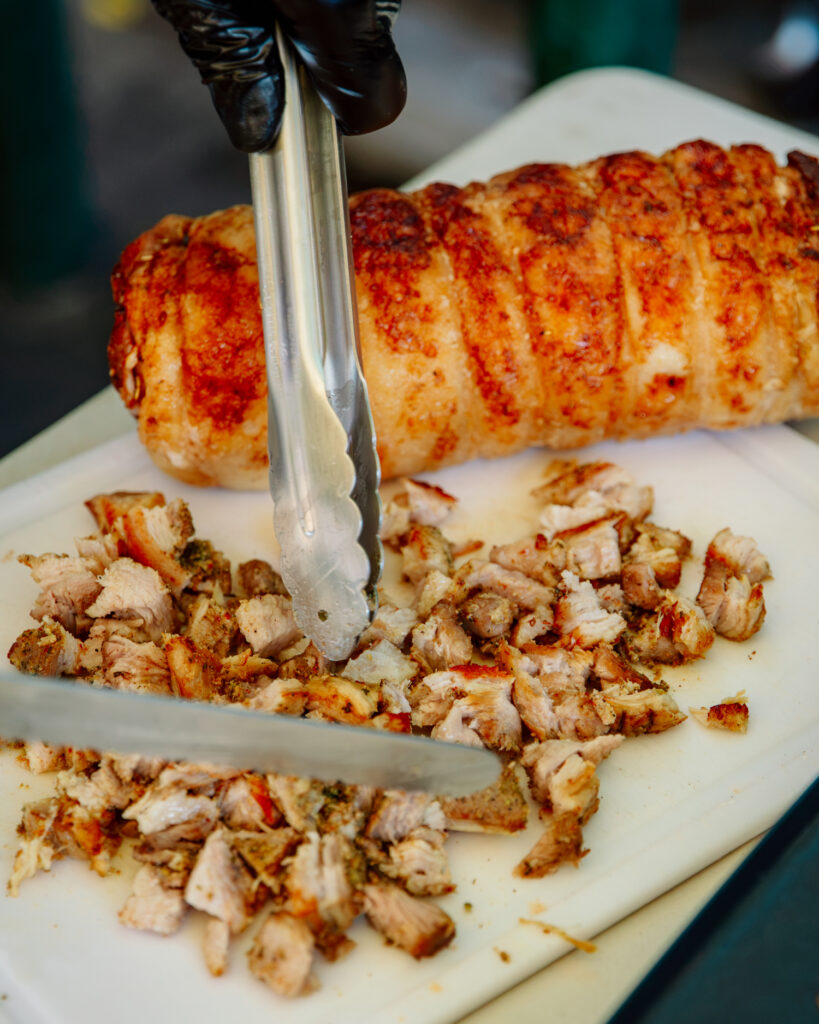 Porchettaboudit at Miel Brewery porchetta cutting